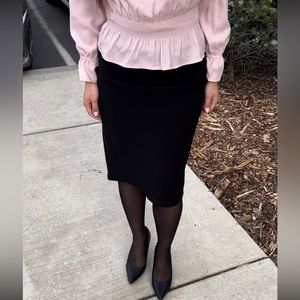 Stretchy black pencil skirt